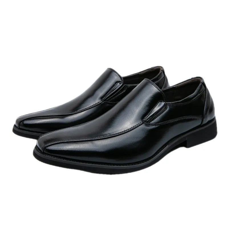 Men's black pointed patent leather casual shoes with a flat rubber sole and totem detail
