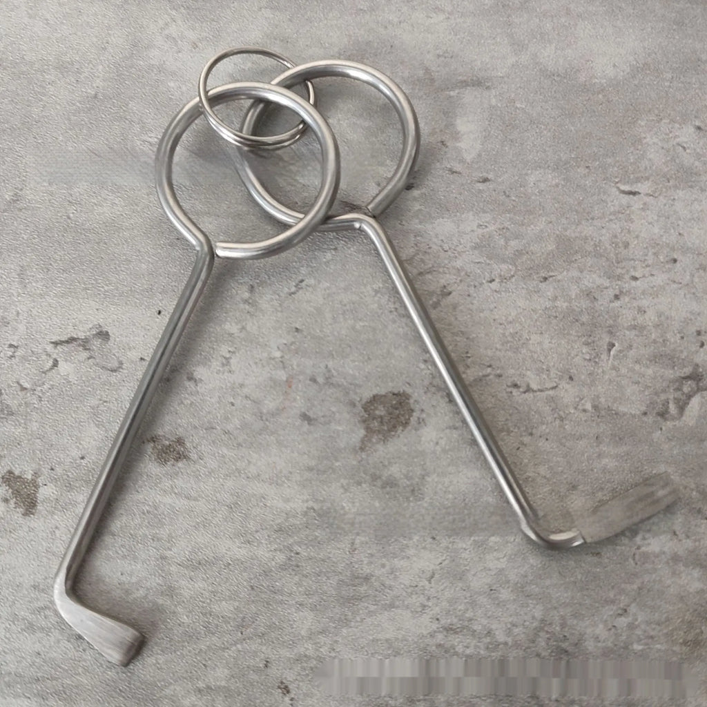 Two alloy wrench tools from portable maintenance set on plain background