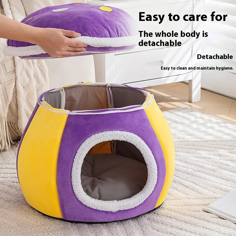Purple mushroom-shaped cat bed with detachable top blanket on grey carpet