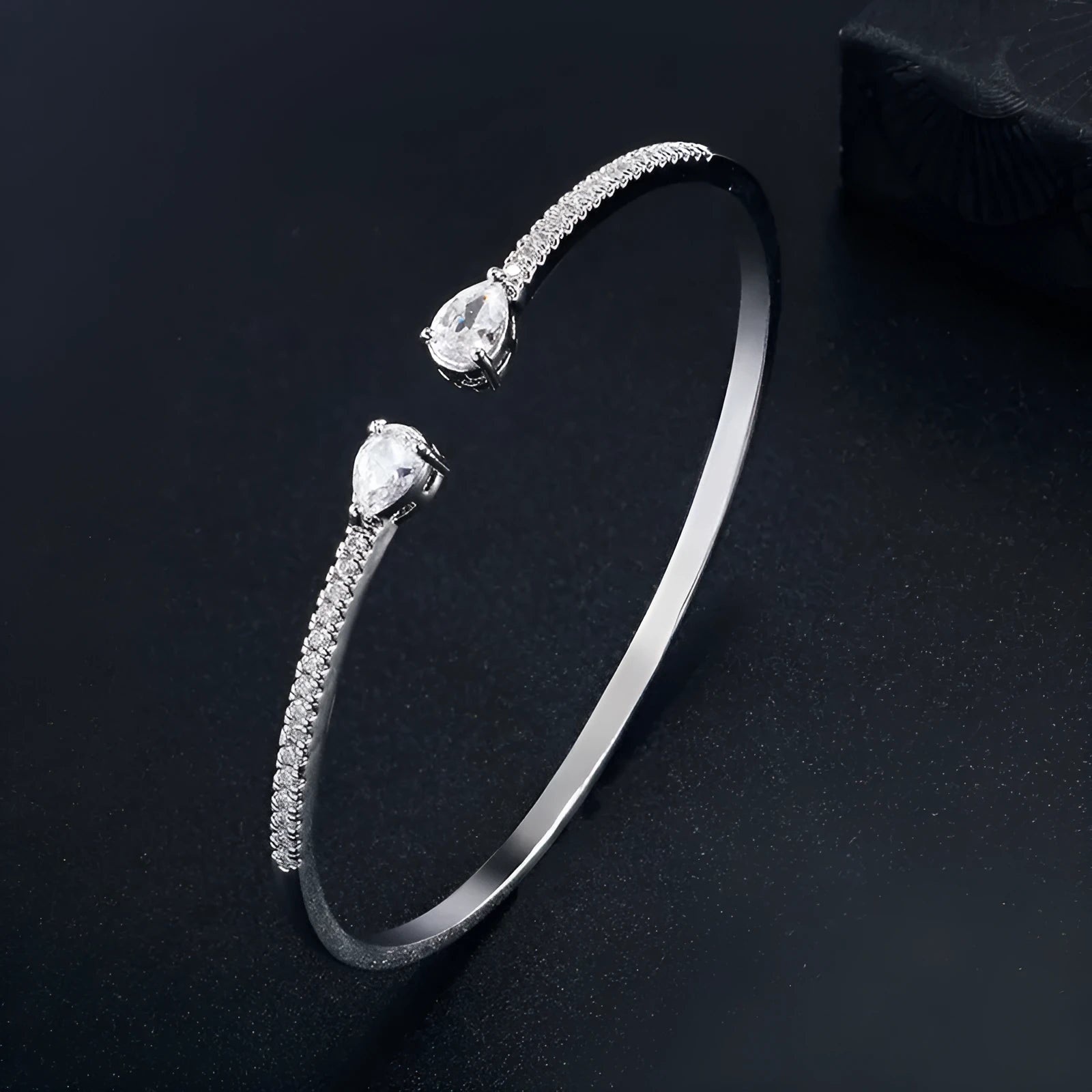 Multi-zircon copper bracelet with inlaid stones in blue or white colour options