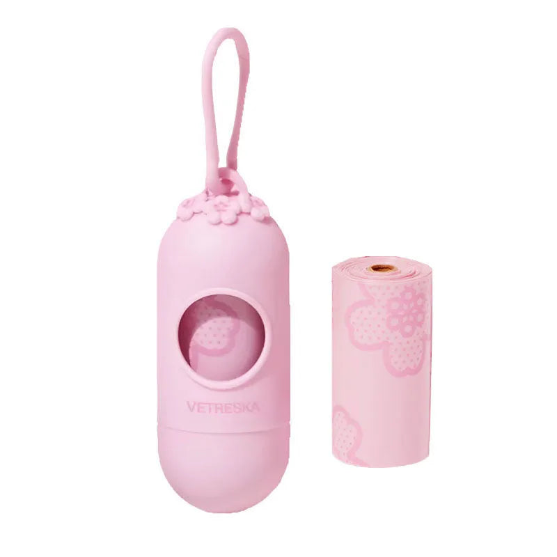 Portable dog poop bag dispenser capsule with scented inner bags in strawberry, orange and cherry blossom options