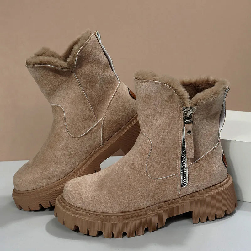 Women's black faux suede snow boots with thick plush lining and side zip closure