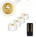 Four white plastic LED tealight candles with flickering flame effect on a table.