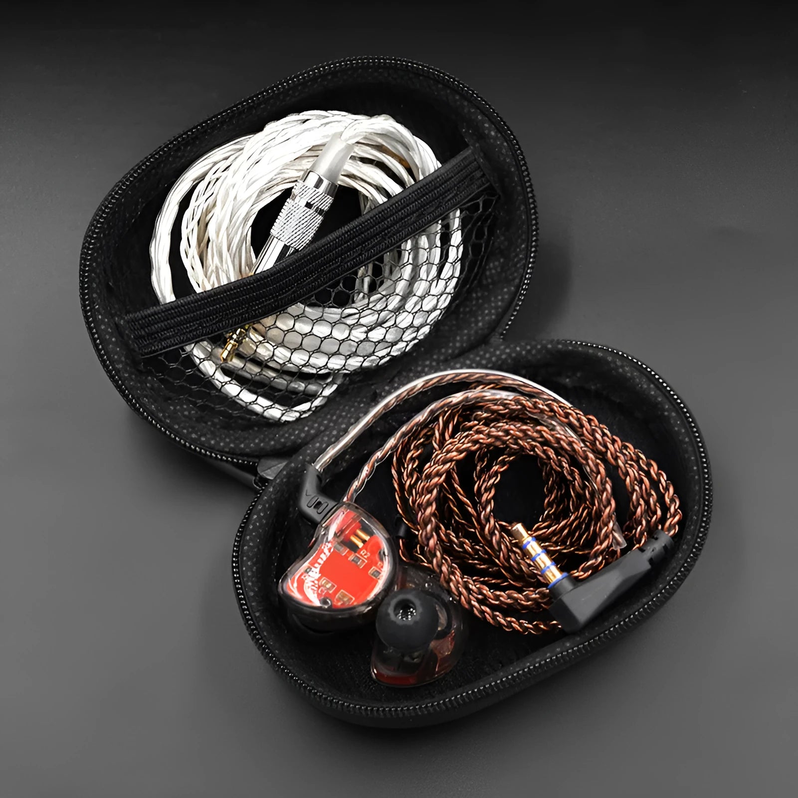 Black oval leather earphone storage pouch for compatible headphone models.