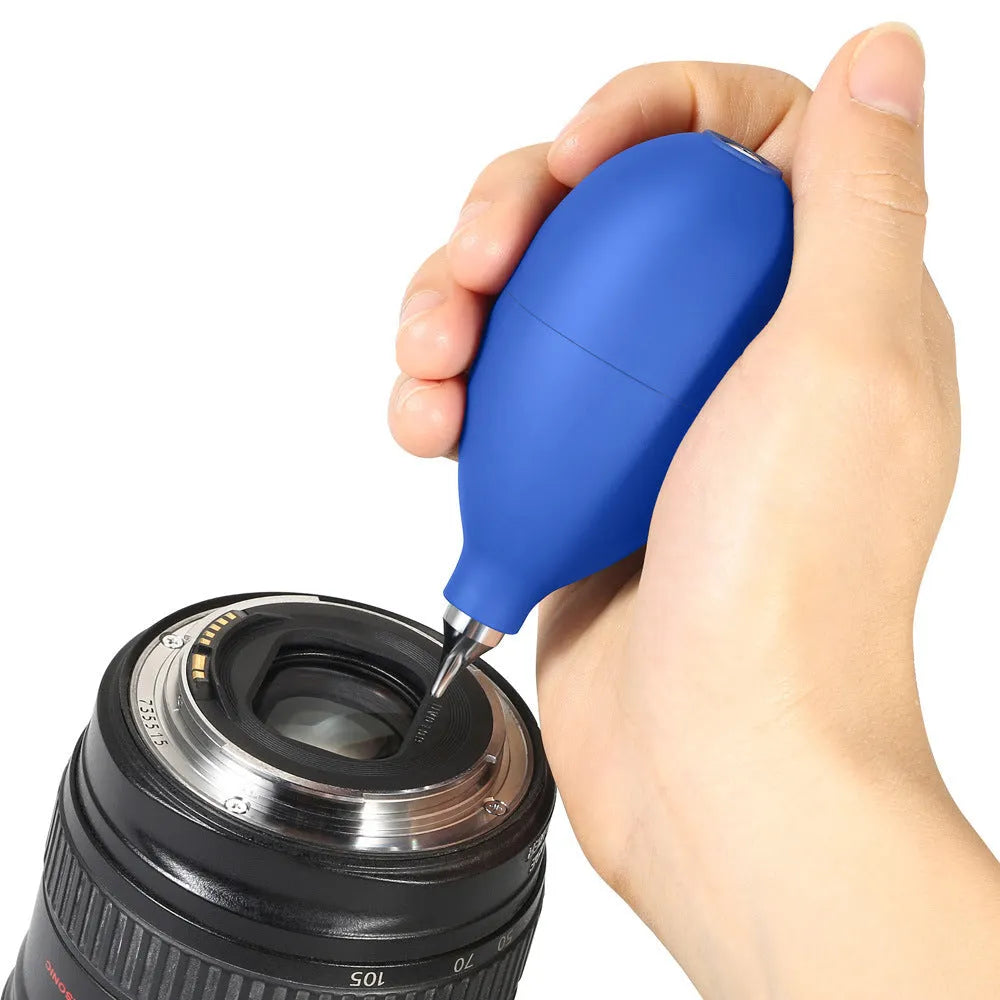 Blue and black rubber handheld dust removal air blower ball for cleaning cameras and phones.