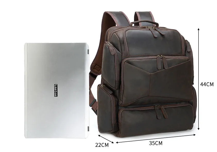 Dark brown genuine leather backpack with 17-inch laptop compartment and multiple organisational pockets