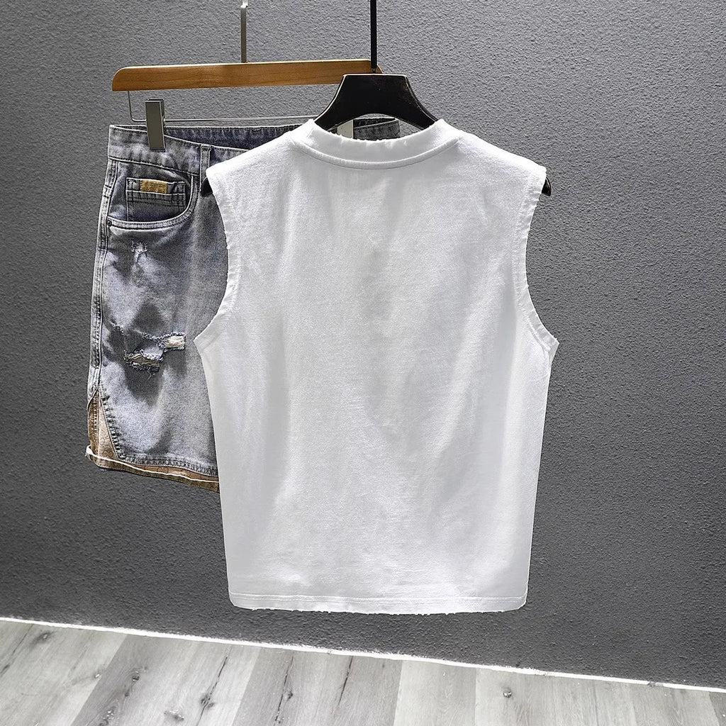 Men's solid black loose-fit cotton sleeveless t-shirt with a straight hem on a white background.