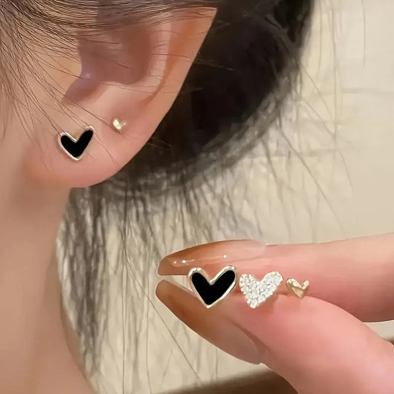 Women's fashion heart earrings set with 3 pairs in gold, black, and pink alloy electroplated colours