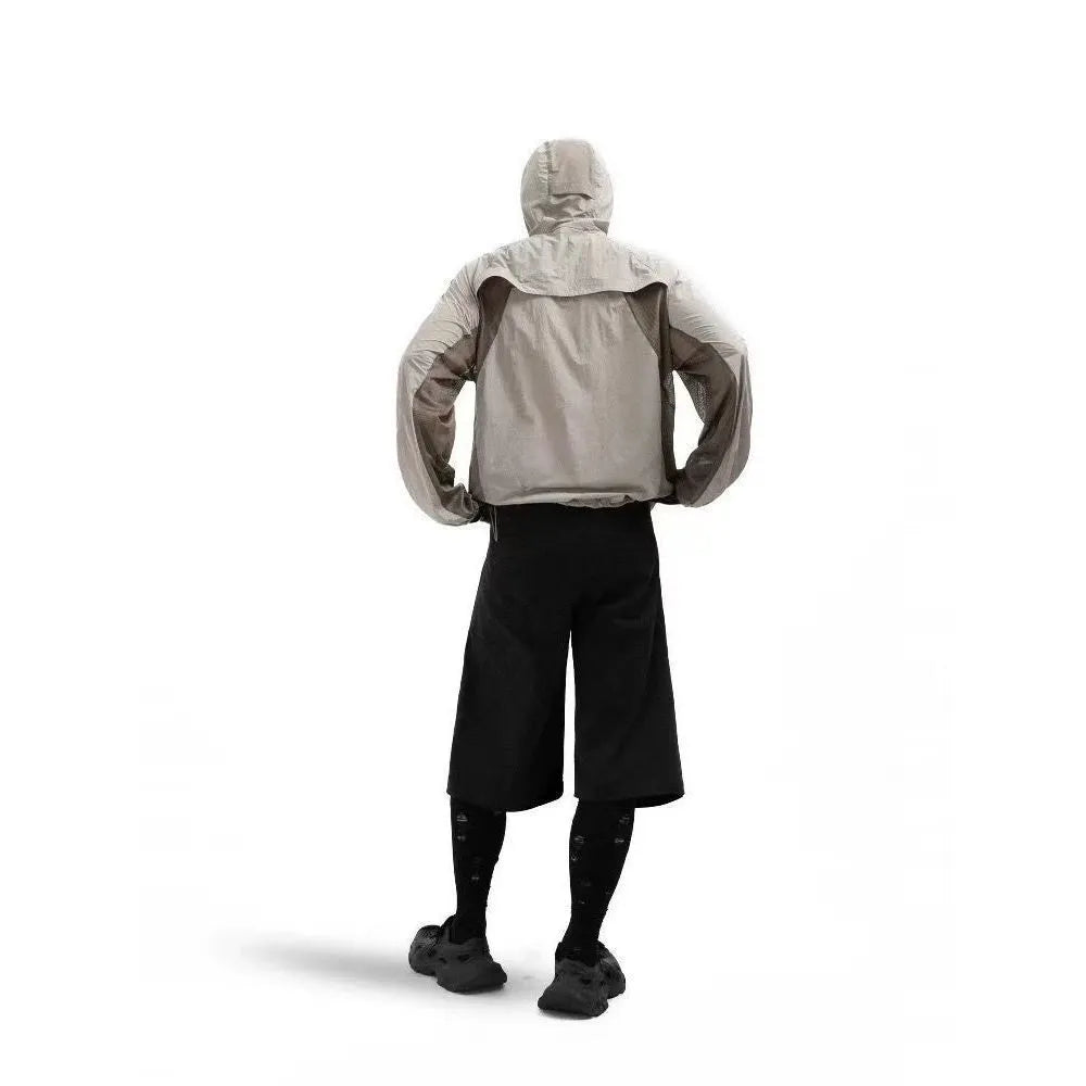 Mesh stitching sun protective clothes in desert brown, a thin nylon UV protection garment.