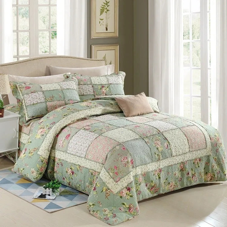 Pure cotton quilted bedspread and pillowcase three-piece set in a chosen colour pattern on a bed.