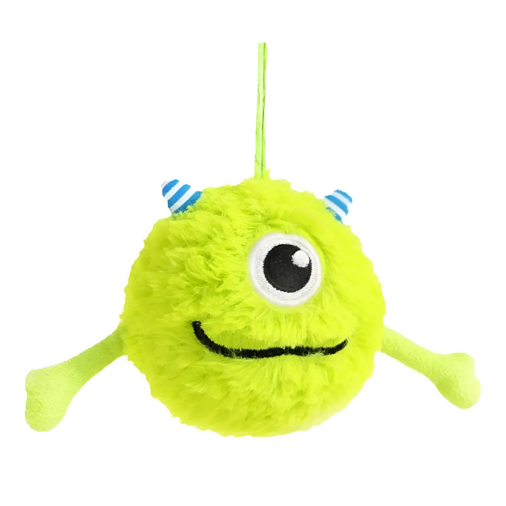 Green interactive dog toy ball with plush exterior and sound activation feature