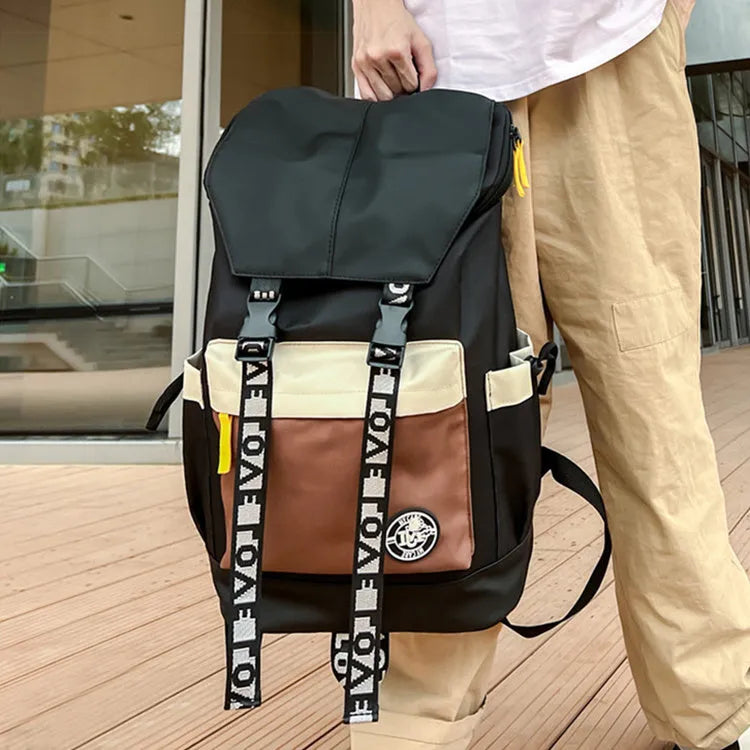 Oxford cloth backpack for junior high students in black, green or red with three carrying options.