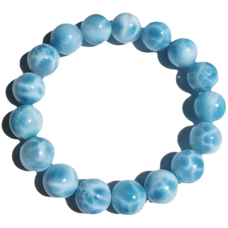 Handmade blue sea-pattern natural crystal Bodhi bracelet with pearl accents on wrist