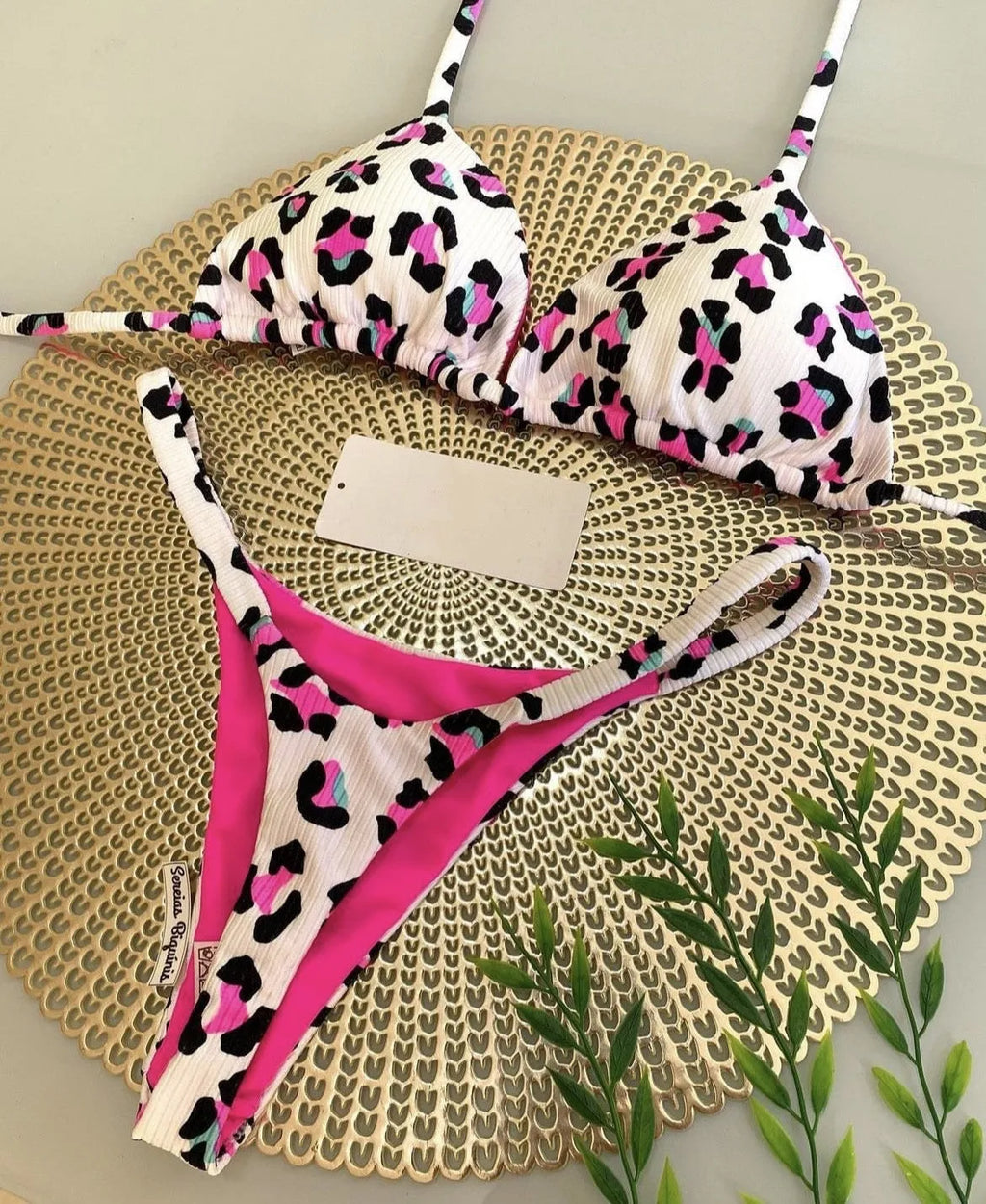 Women's printed bikini swimsuit with quick-drying fabric shown in one of three available colour options
