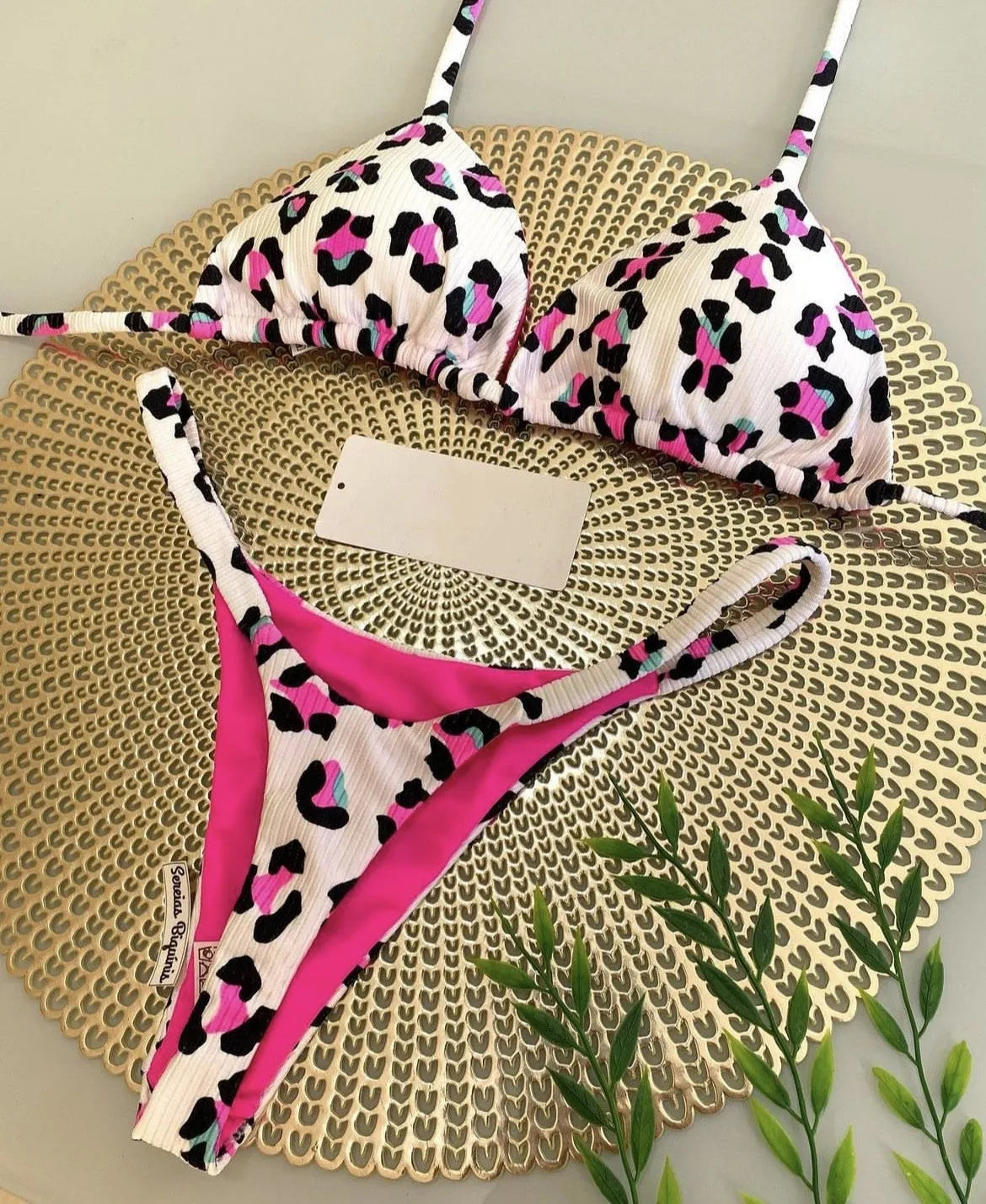 Women's printed bikini swimsuit with quick-drying fabric shown in one of three available colour options