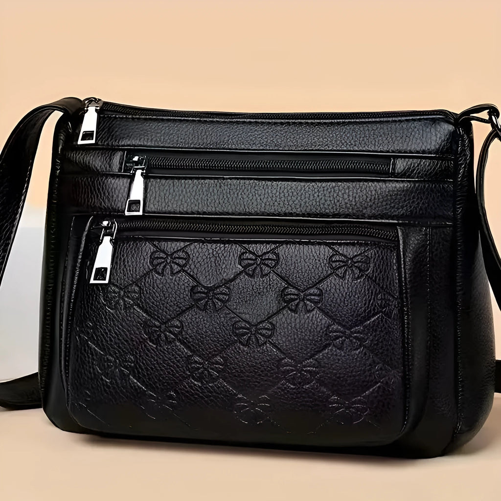 Butterfly Black PU shoulder messenger bag with embossed detail and horizontal square shape