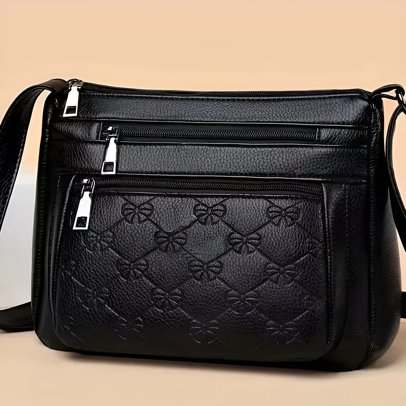 Butterfly Black PU shoulder messenger bag with embossed detail and horizontal square shape