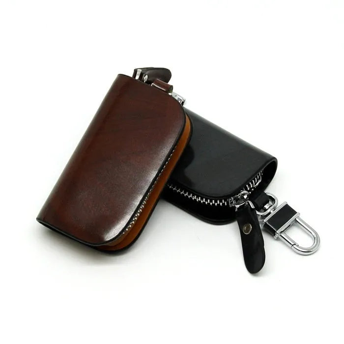 Genuine cowhide leather car key case in black with a frosted finish.
