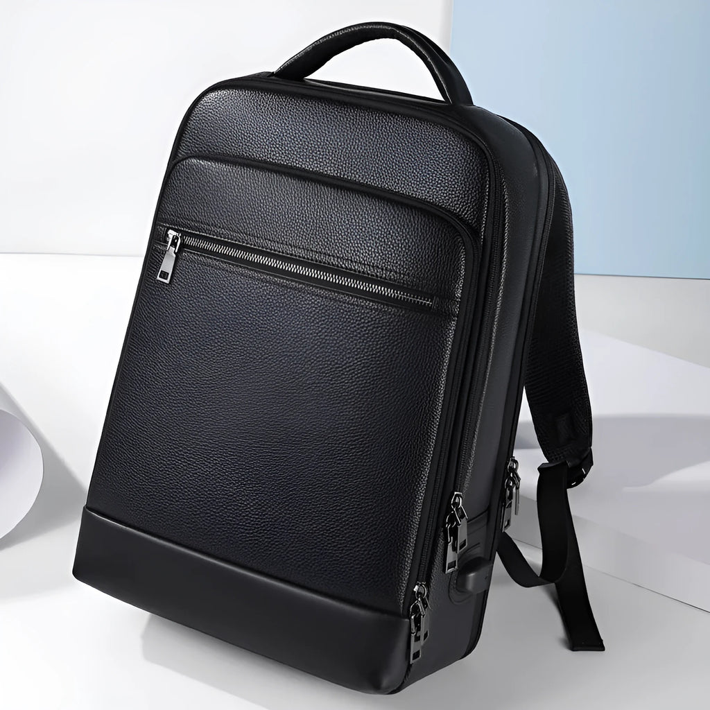 Black genuine leather men's business backpack with curved shoulder straps and sewing line detailing