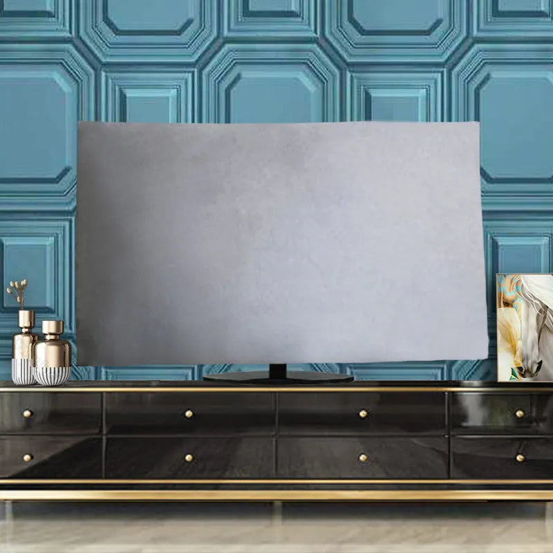 A velvet TV cover in a light blue colour, showing its soft texture and national style pattern, laid flat.