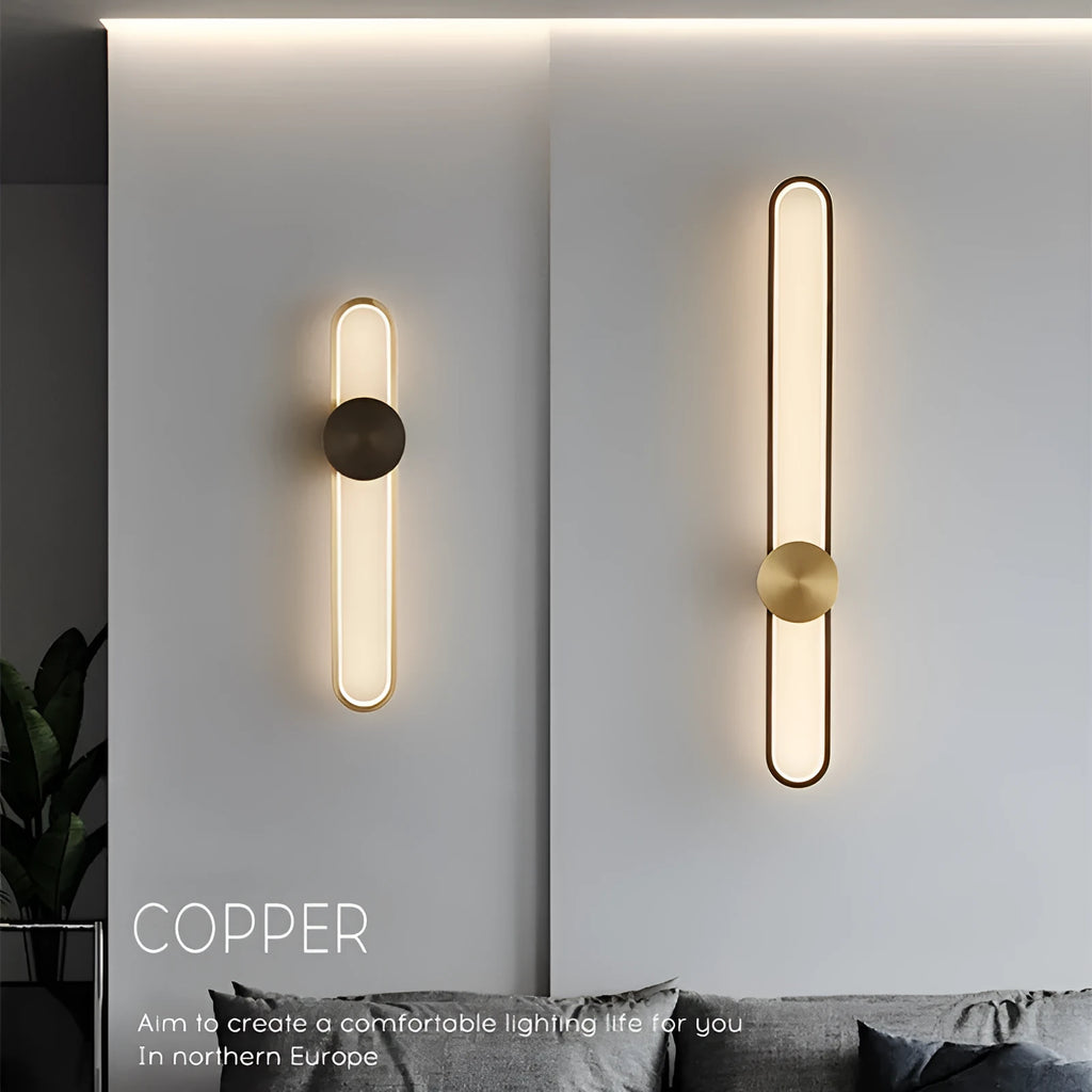 Round 60cm modern wall lamp with iron shade in black or gold frame finish.