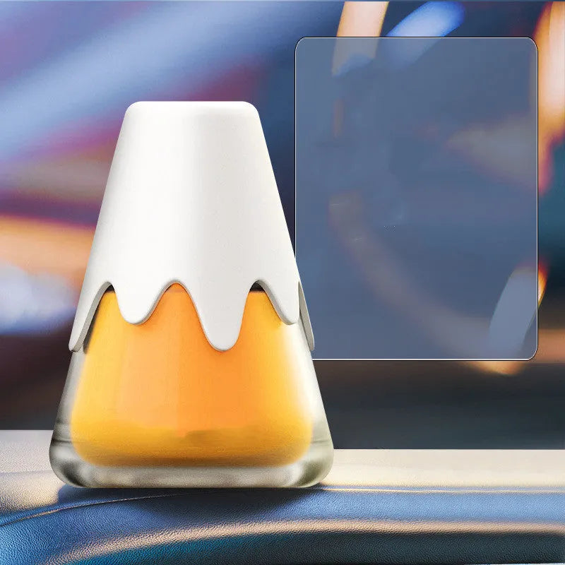 Snow Mountain Cup car aromatherapy diffuser in glass and paste, showing four colour and scent options.
