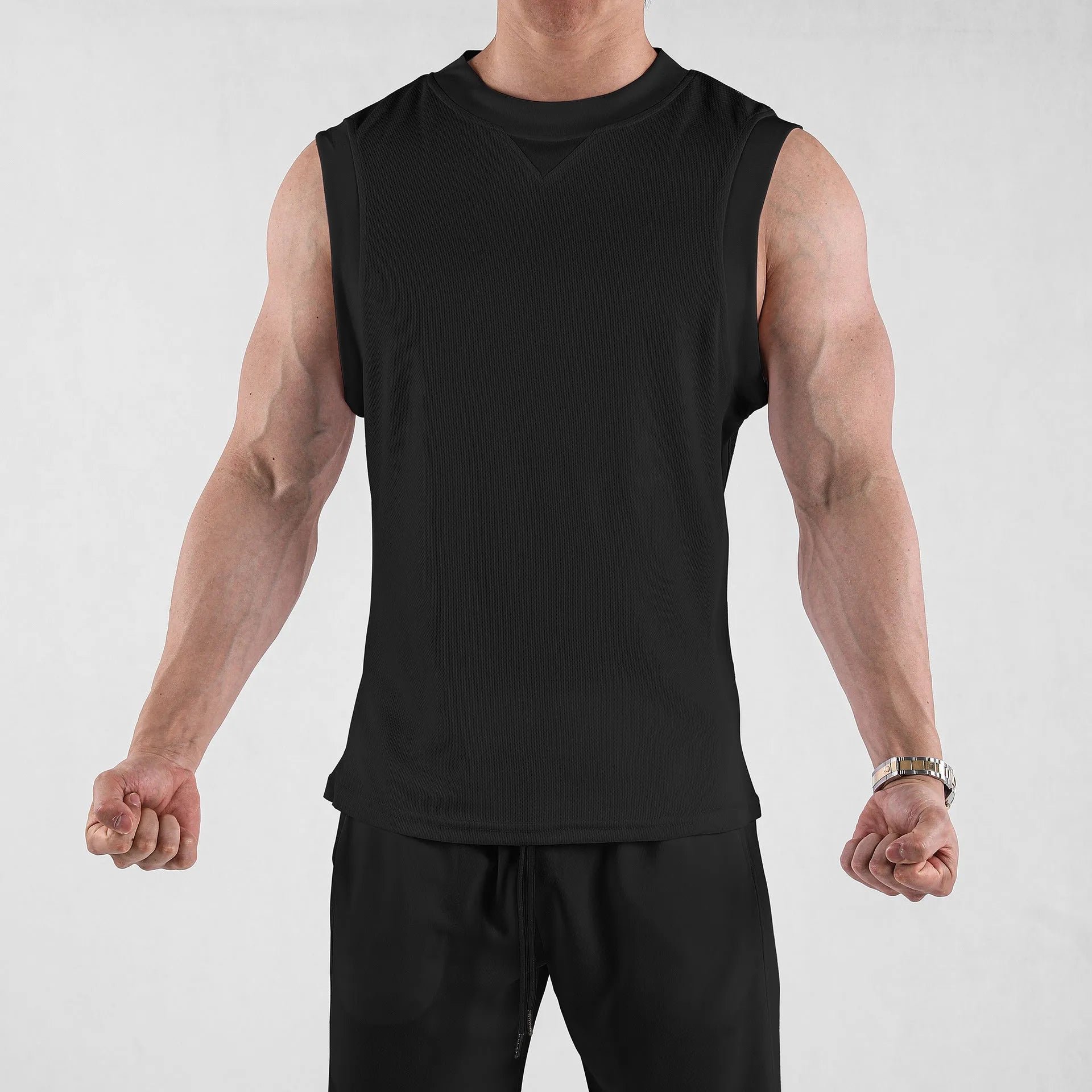 Men's loose black quick-dry sport vest on a hanger