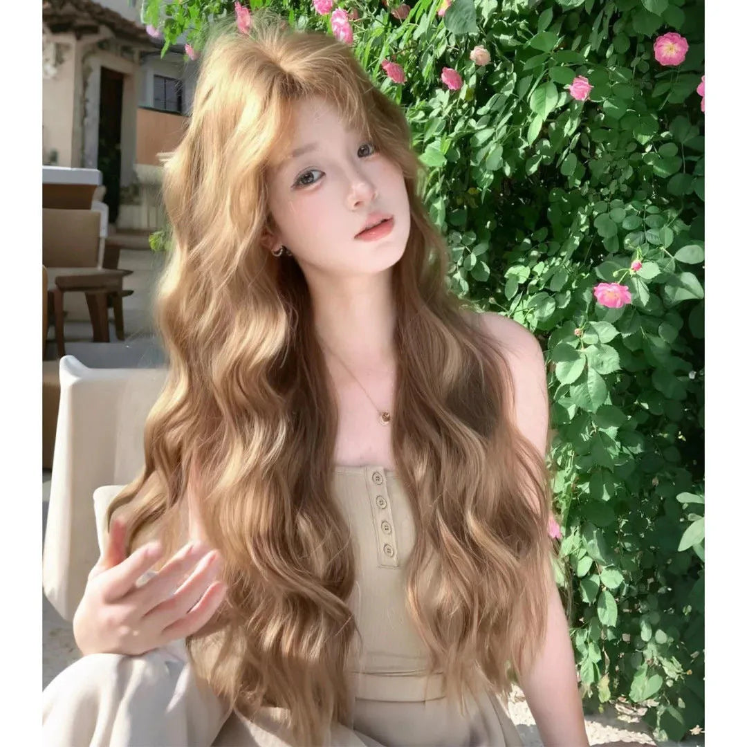 Medium length curly synthetic wig in linen brown colour with defined curls and included hair net