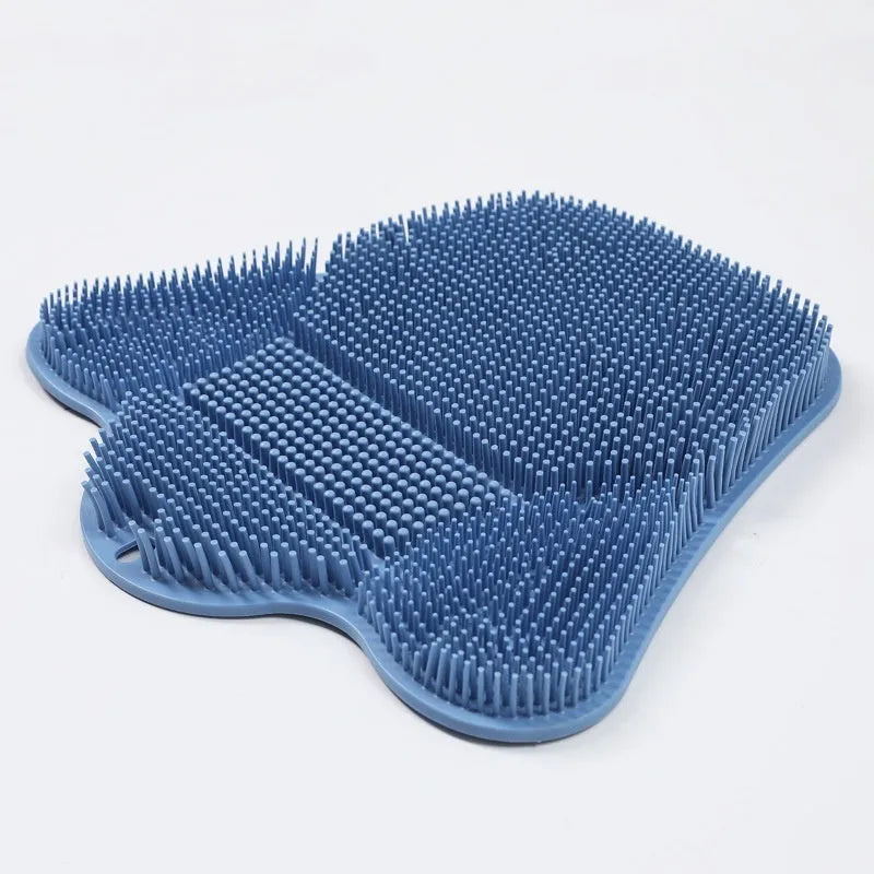 Blue silicone bath massage cushion with textured surface measuring 31 by 32 centimetres