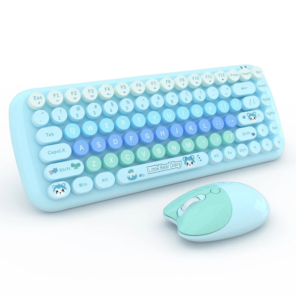 Candy pink wireless keyboard and mouse set with miniature cartoon design on a desk.