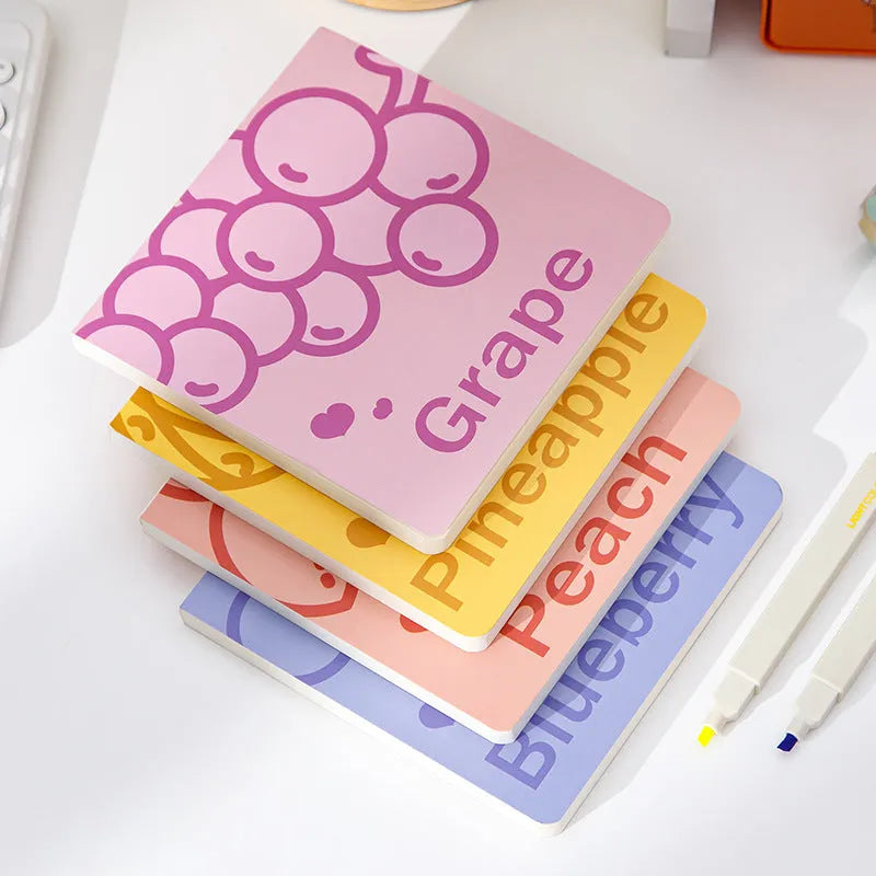 Square notebook with embossed fruit cover showing pineapple design, 14.5cm dimensions