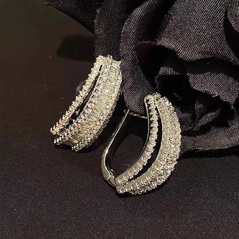 Geometric-shaped copper stud earrings with zircon white gold colour finish for women