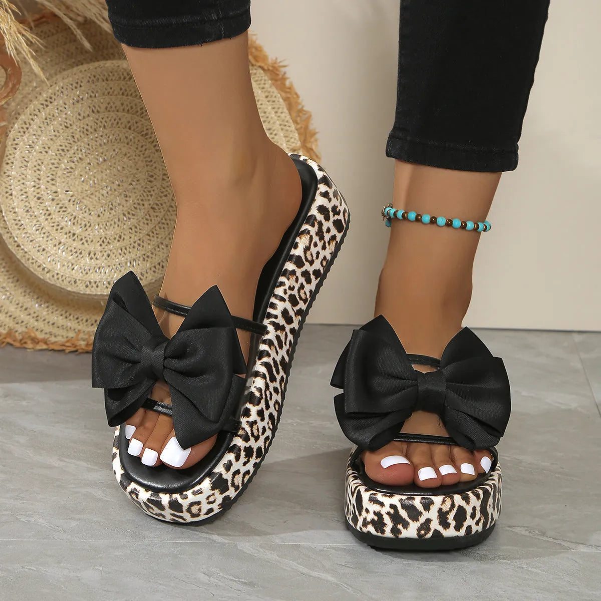 Leopard print women's beach slippers with thick sole and round toe in black or white