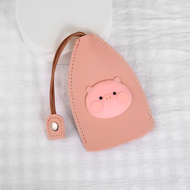 Colourful cartoon pull-out key case made from PU leather, showing the key extended from its protective sleeve.