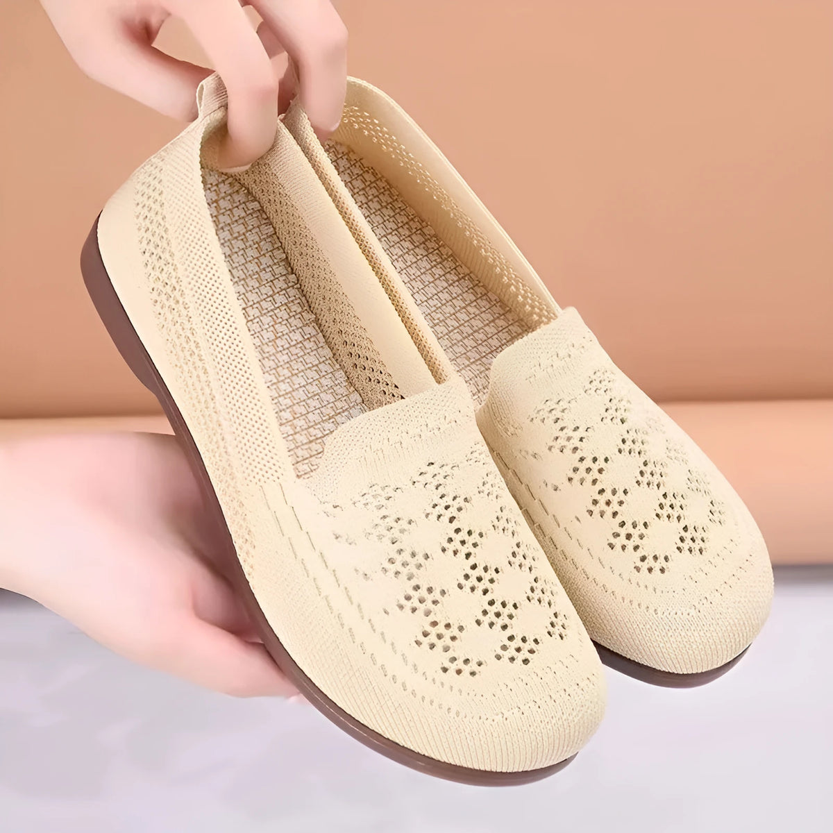 Women's beige low-top mesh tennis shoes with a round toe and anti-skid PVC sole, shown on a neutral background.