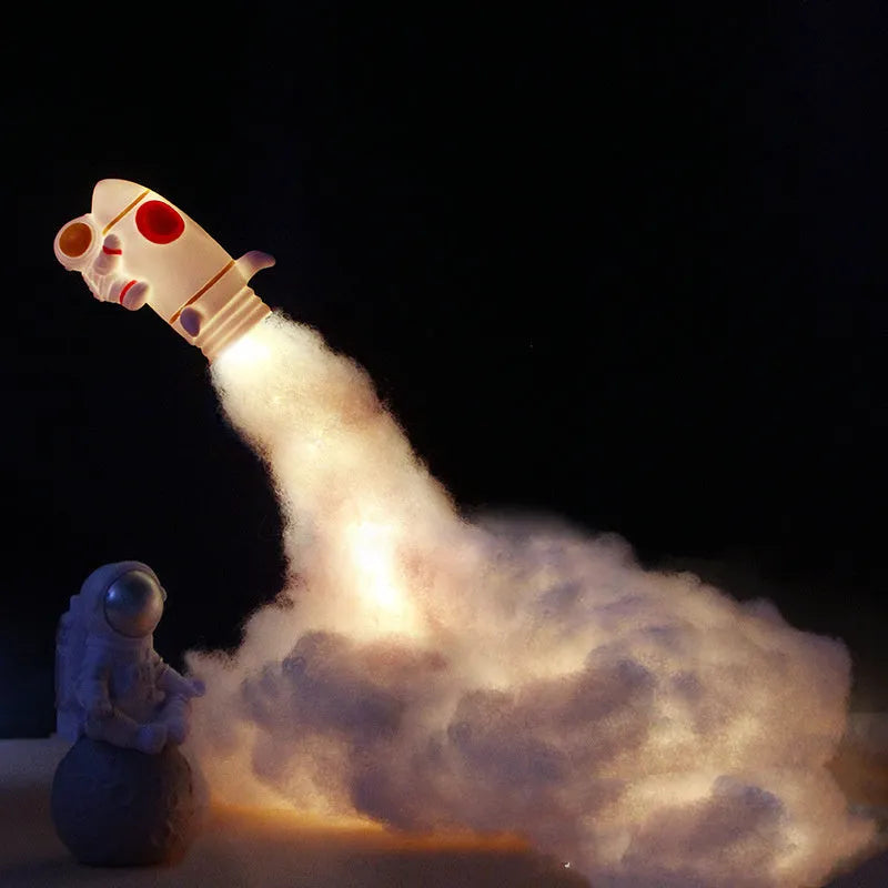 DIY astronaut rocket night light kit with warm LED string lights and assembly materials