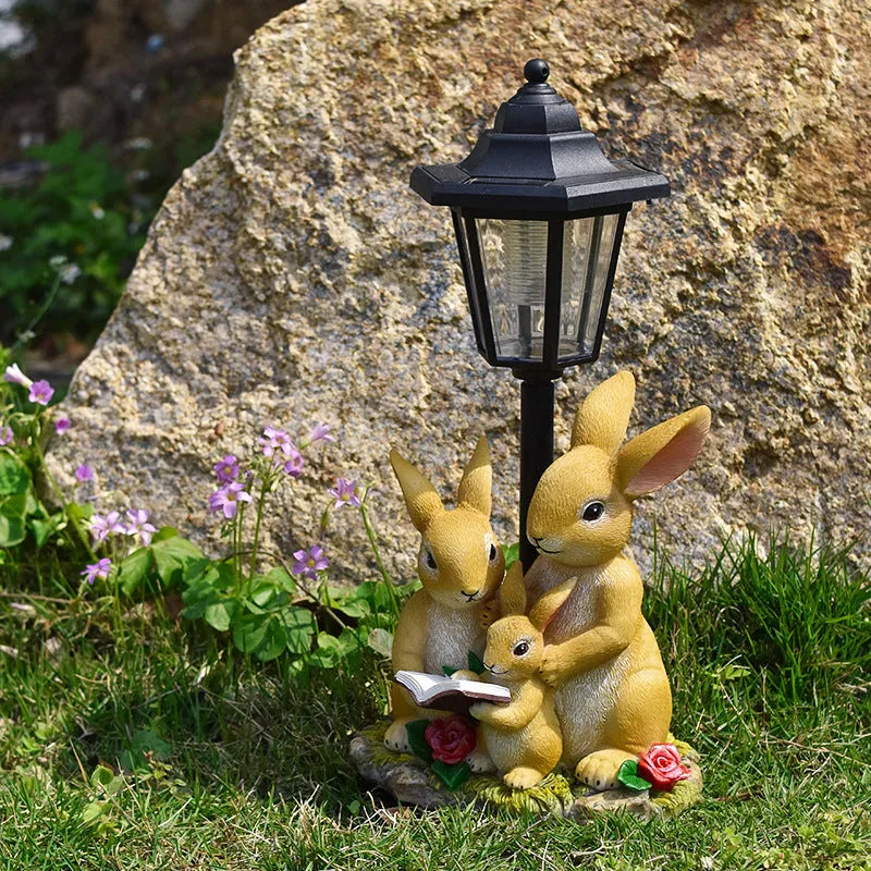 Solar-powered hexagonal garden lamp in American country style resin, showing decorative animal figure design option.