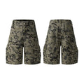 Retro washed cotton workwear shorts in loose fit and fifth pants length, shown in camouflage colour.