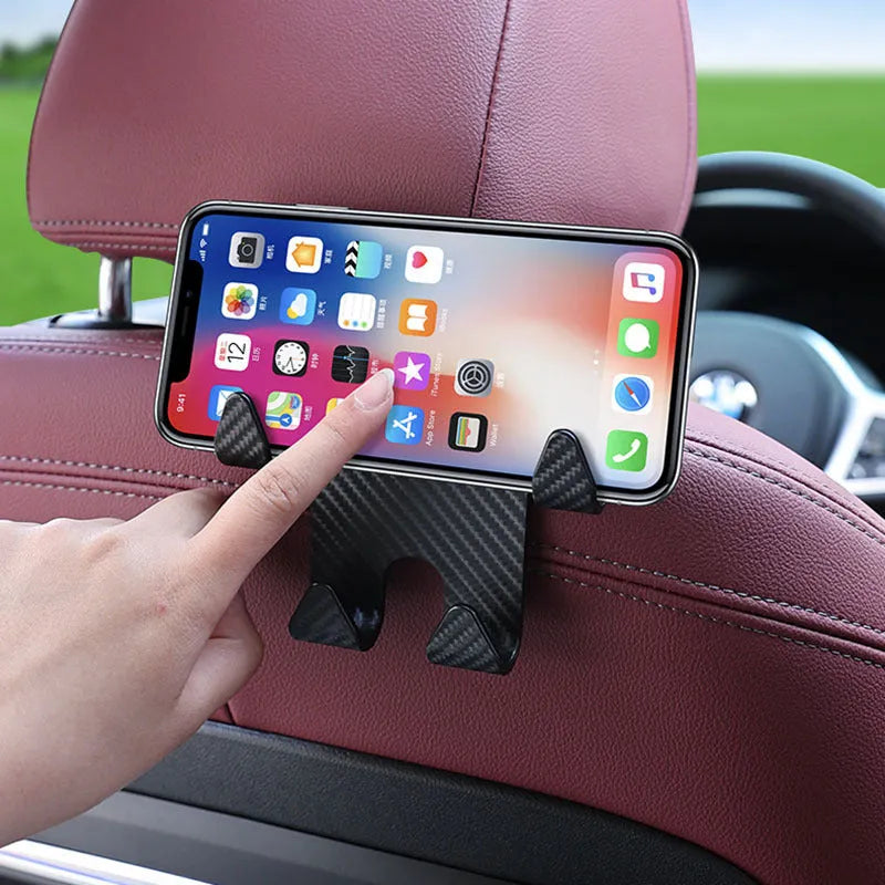 Black ABS plastic car hook with integrated mobile phone holder bracket for rear seat back.