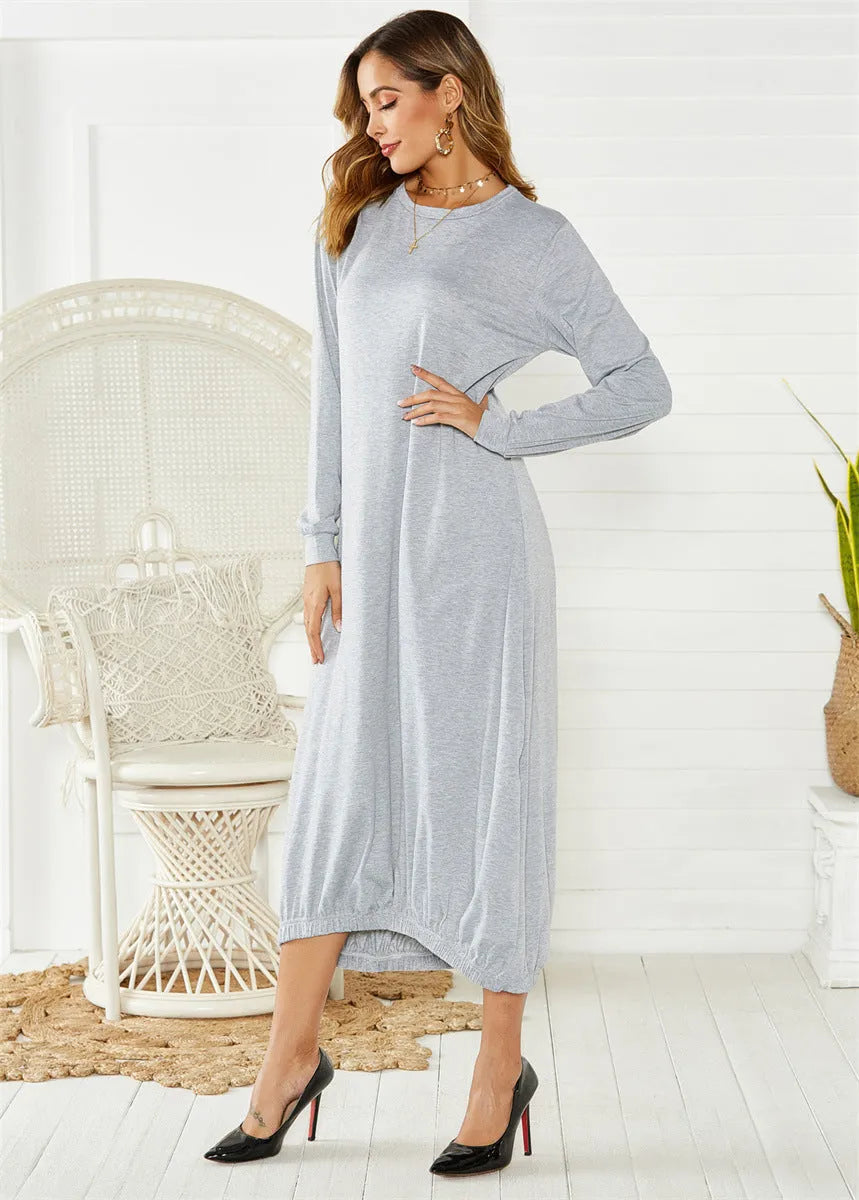 Loose long black lantern dress with a lace-up crew neck, showcasing a casual pullover style.