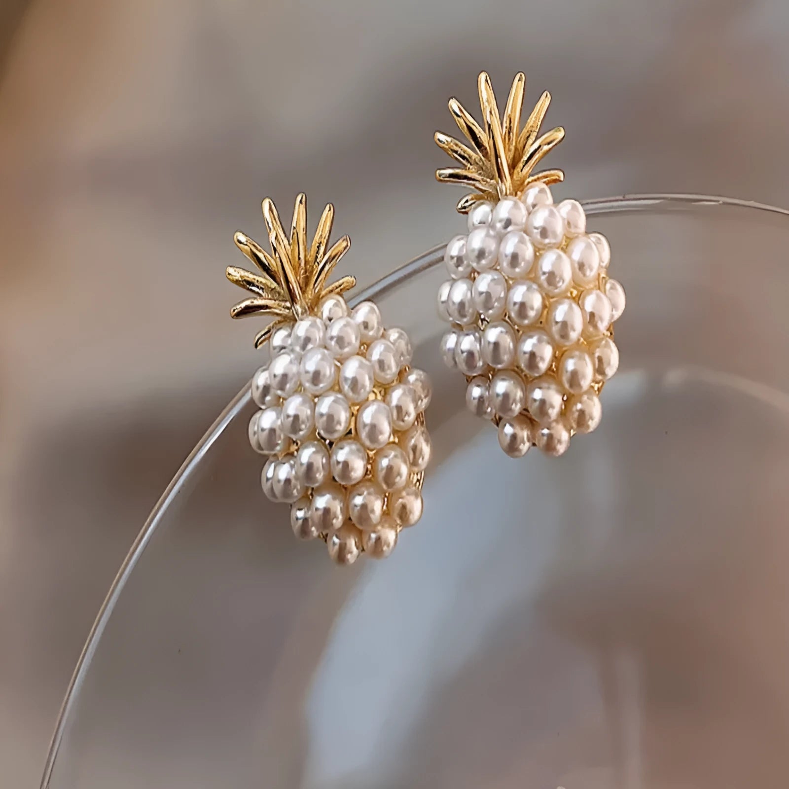 Korean style pineapple starfish pearl earrings in alloy with electroplated finish and artificial gemstone inlay