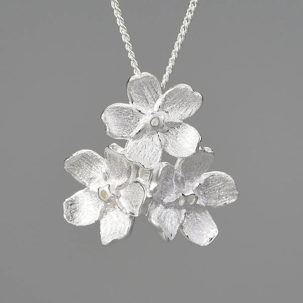 Myosotis Sylvatica sterling silver pendant with floral design in gold, silver, or silver gold electroplated finish.