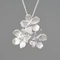 Myosotis Sylvatica sterling silver pendant with floral design in gold, silver, or silver gold electroplated finish.
