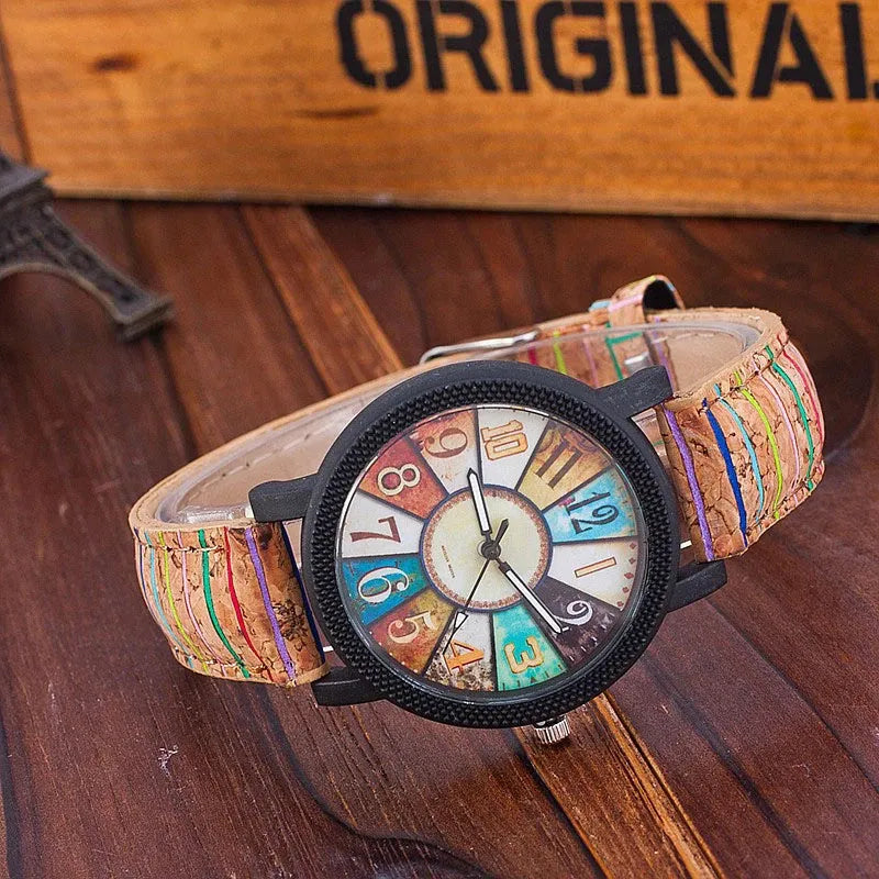 Women's vintage leather strap quartz watch with 37mm round dial and stainless steel buckle