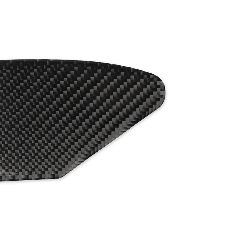 Carbon fibre textured sticker for car USB charging port panel with 3M adhesive backing.