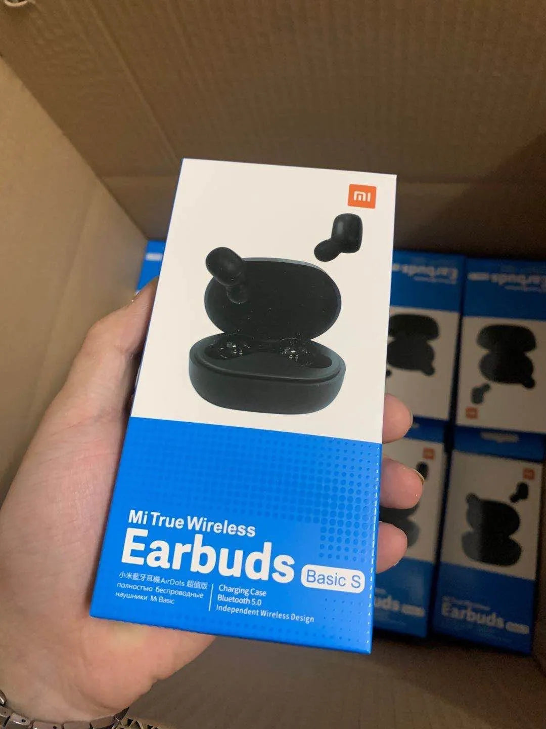 Redmi AirDots 2 black true wireless earbuds with charging case on a white background