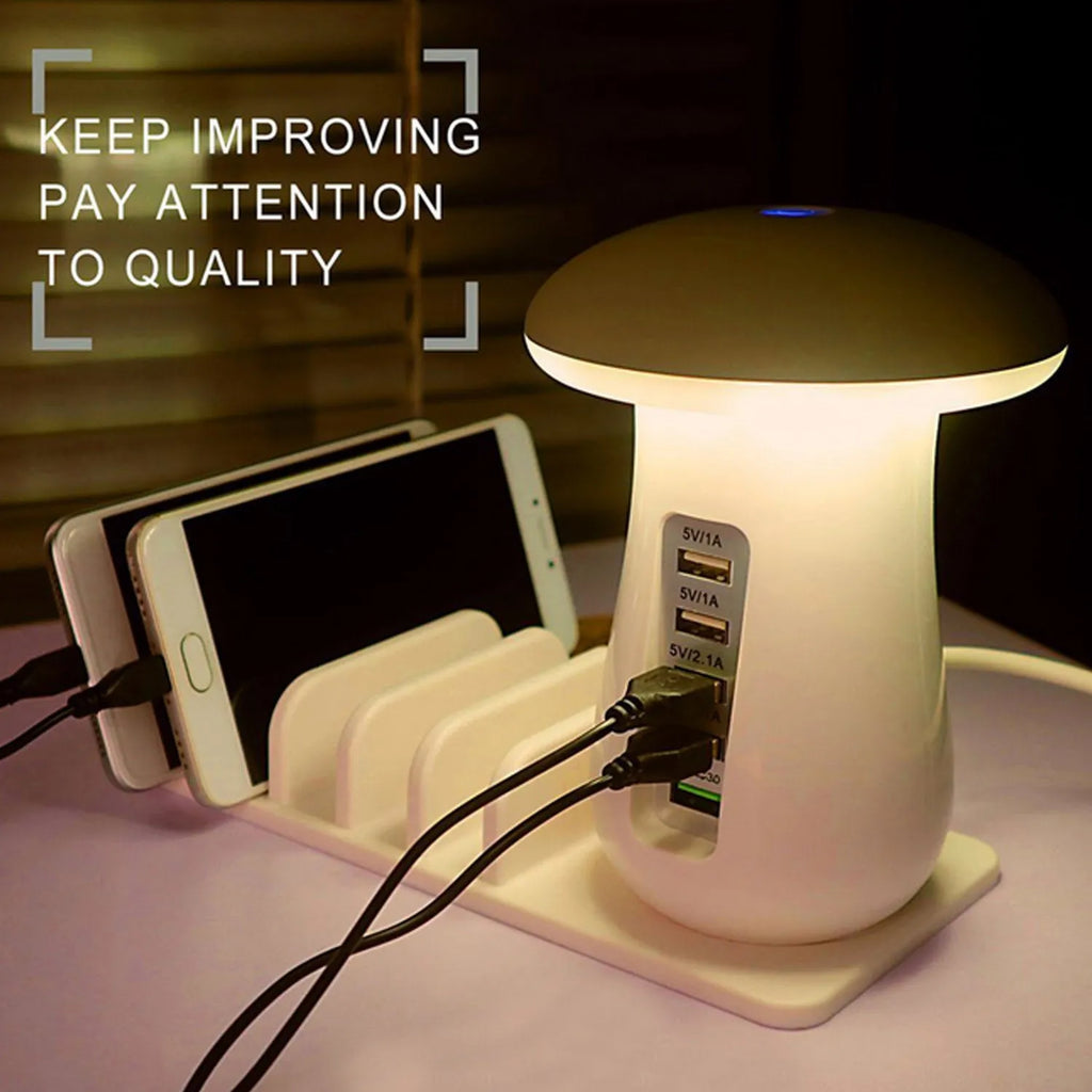 White mushroom-shaped LED lamp and 5-port USB charging dock station on a wooden desk.