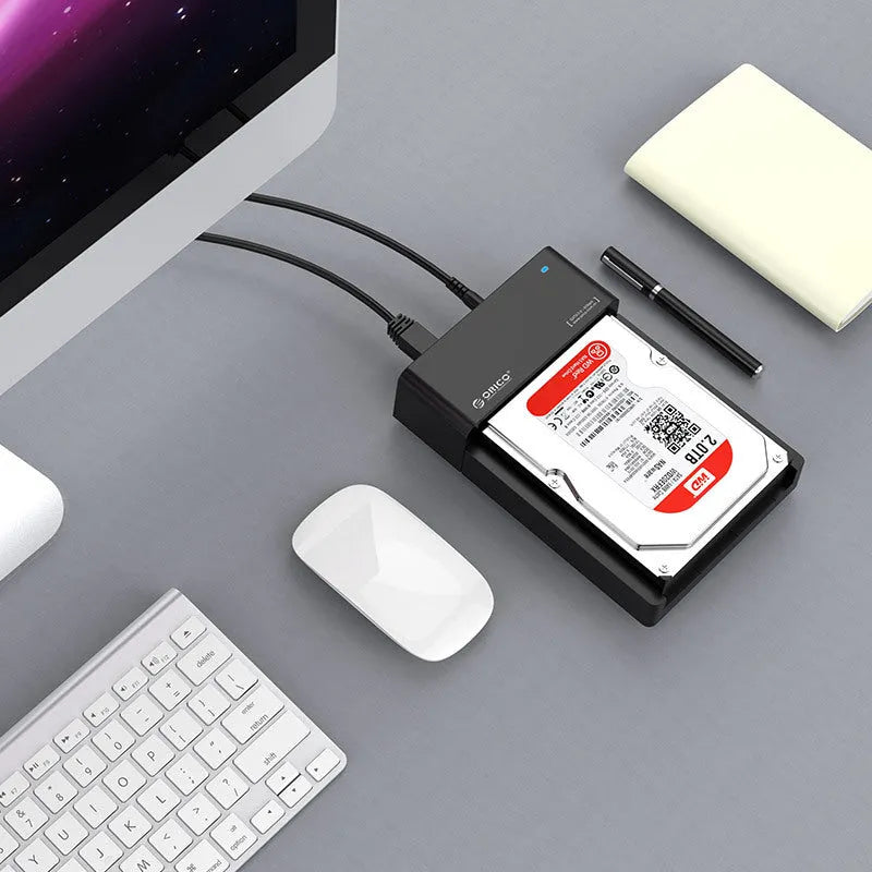Black universal hard drive box for 2.5 inch and 3.5 inch SATA hard drives with data cable