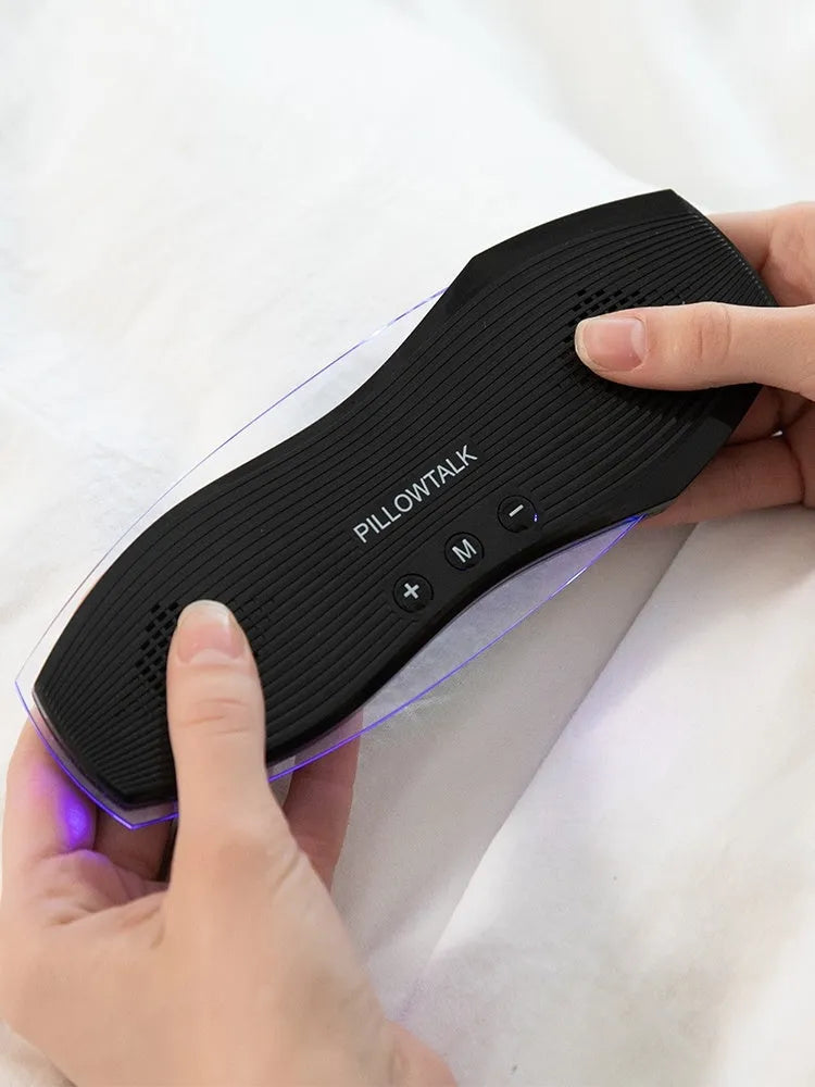 Black true wireless Bluetooth earphones with microphone shown with USB charging cable.