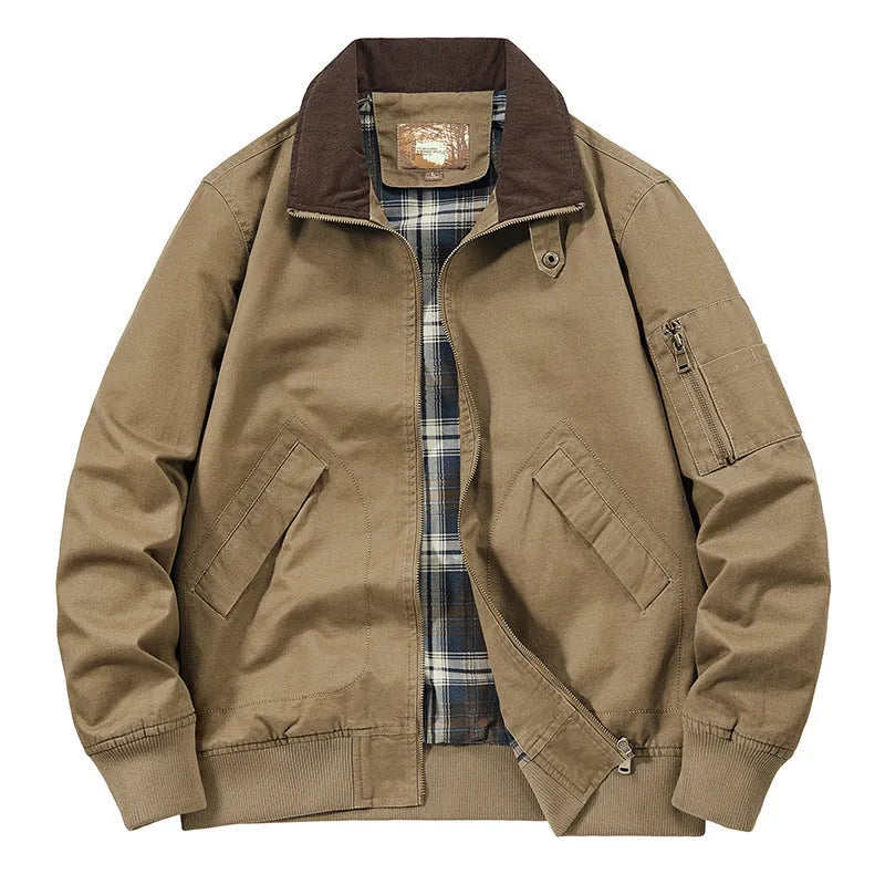 Men's washed cotton baseball-style flight jacket in beige, shown in a casual setting.